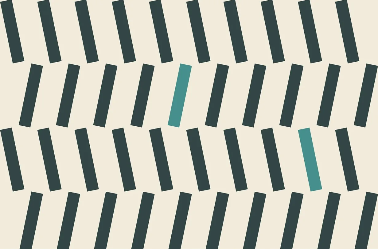 The light pattern: slate tilted tiles in offset rows on butter cream, with two of them in teal