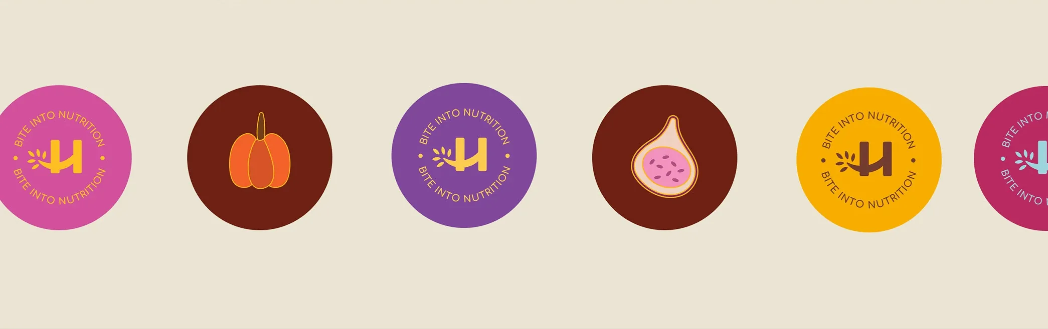 A row of round stickers on cream: the tagline ring around the H in pink, purple, yellow and crimson, between maroon discs holding a pumpkin and a fig